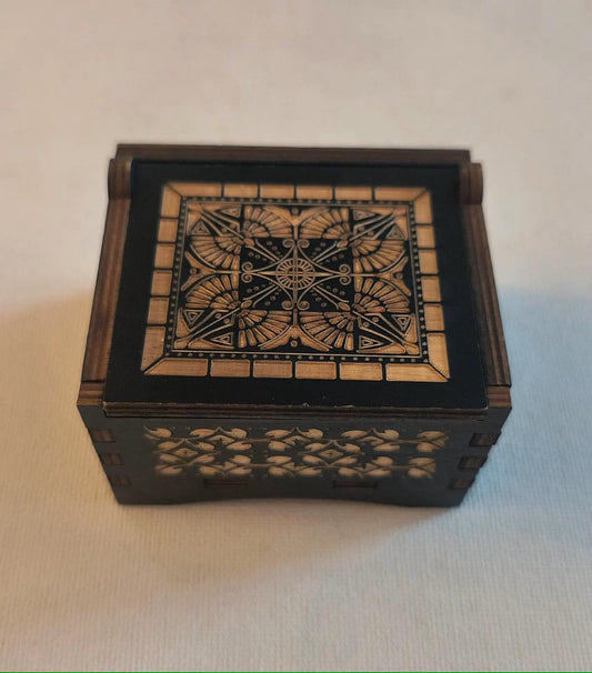 wind up music box with beautiful wood engraving