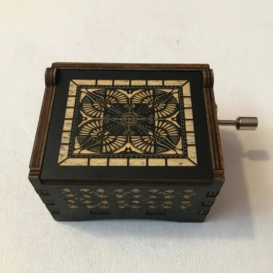 Hand crank music box with beautiful wood engraving