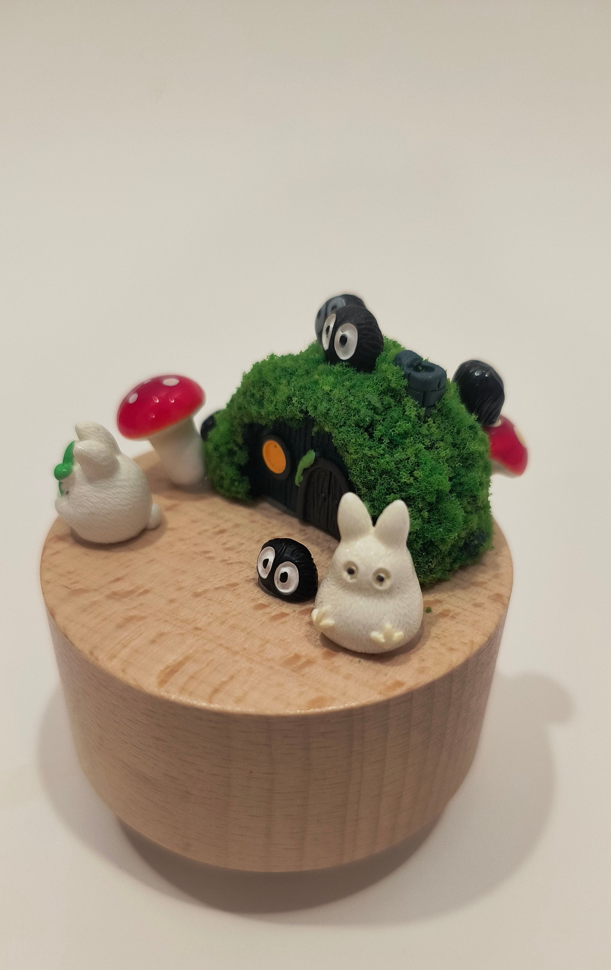 Wooden planter with decorative elements on a white background