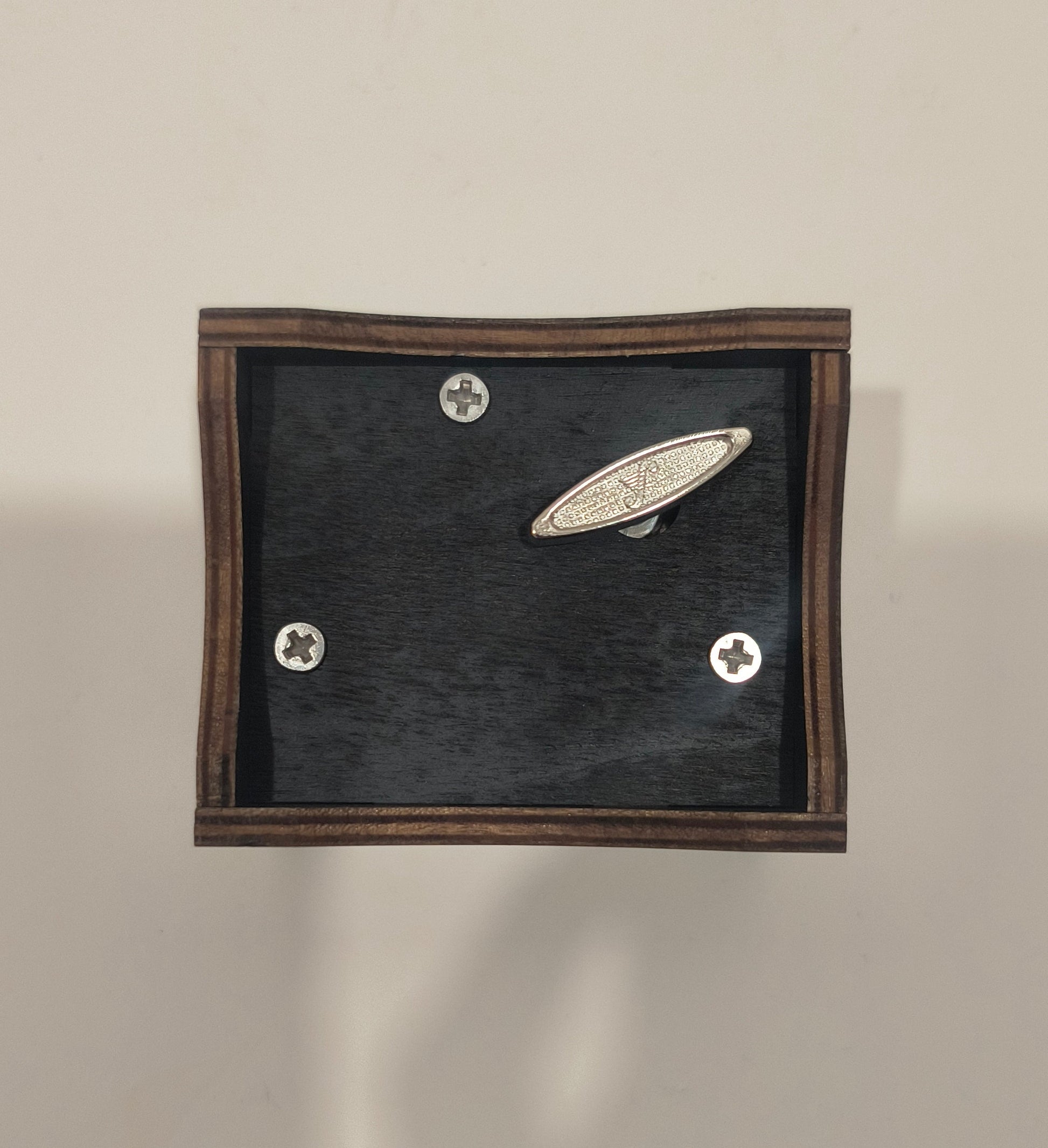 Set of jewelry including rings and a brooch on a dark background