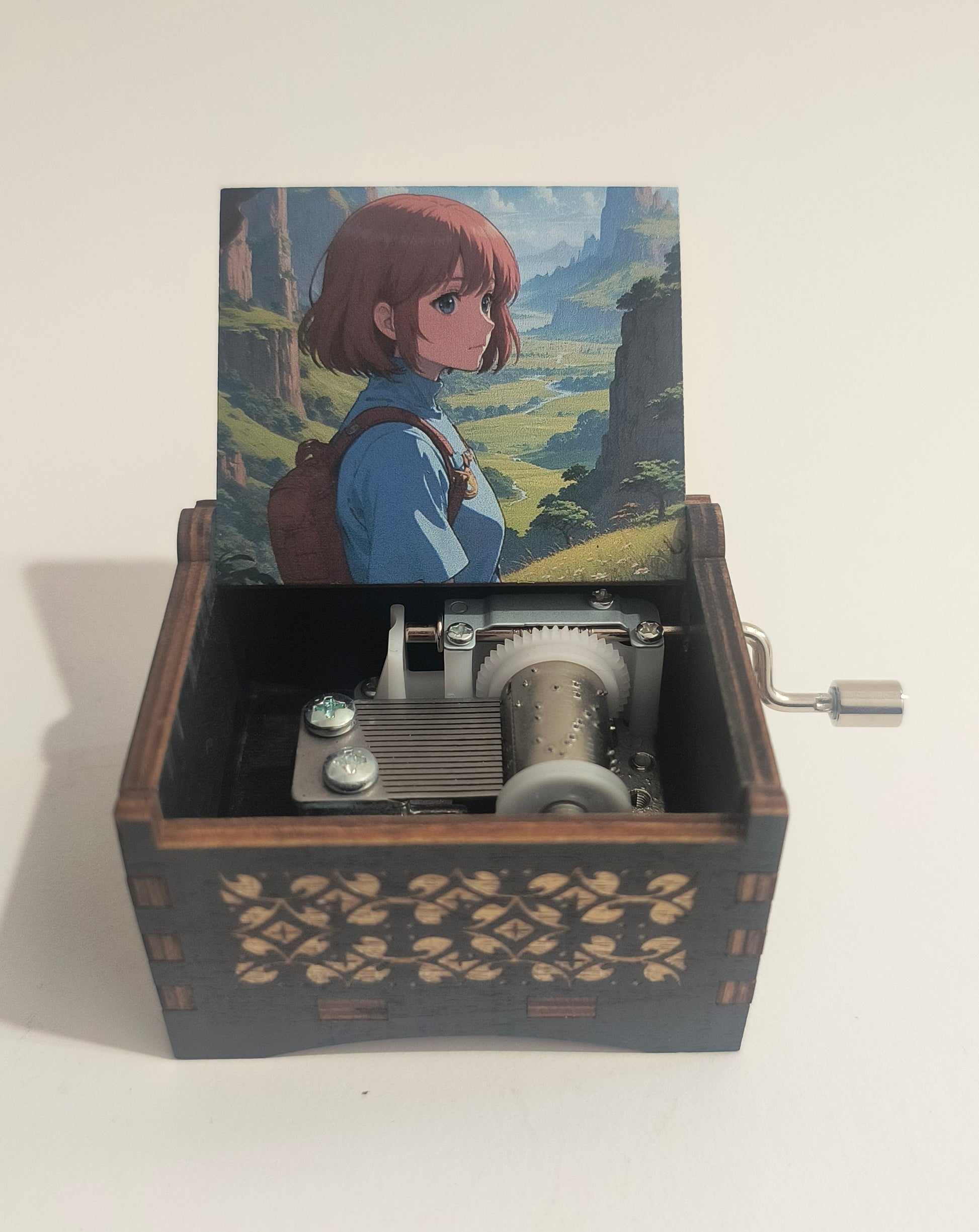 Wooden mechanical toy with animated character on a white background