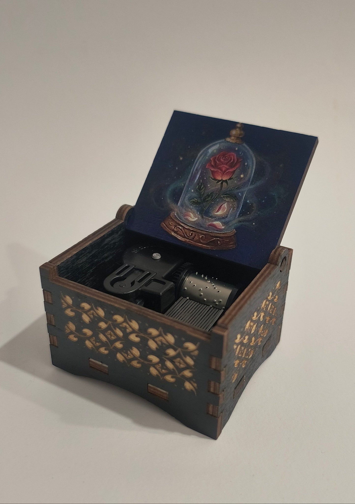 Decorative box with intricate design on a white background