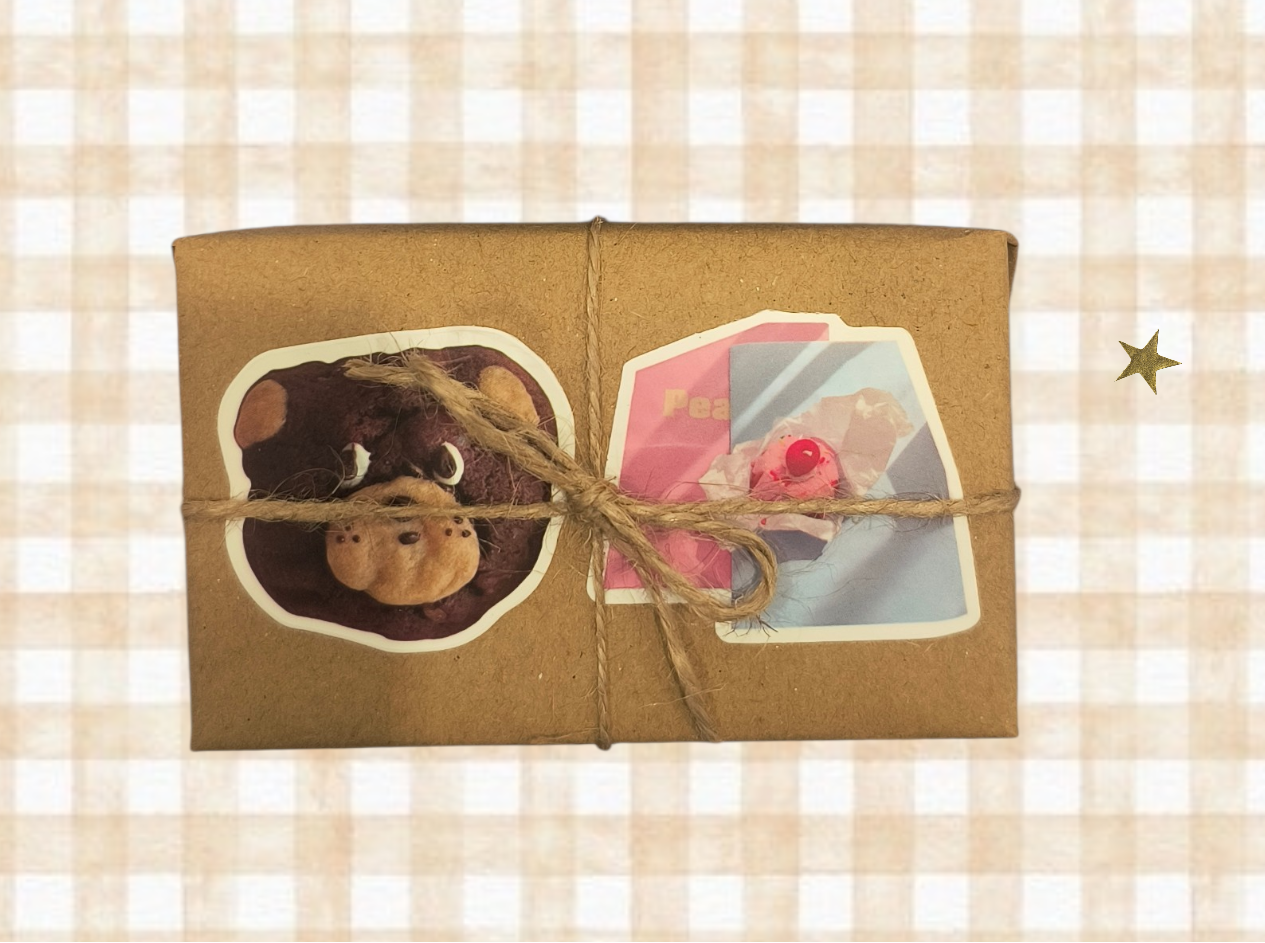 Folded fabric with heart cutout and tied with twine on a checkered background